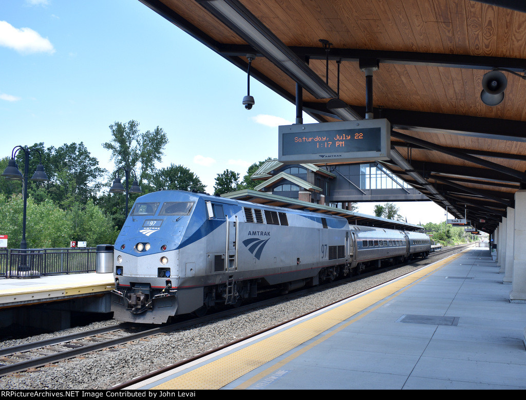 Southbound Amtrak Shuttle Train # 463 departs the depot with P42 # 97 on the point